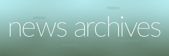 Subtle gradient from hazy emerald to blue mint with the words news archives in the middle.  Words representing AGBU news archives sitting in the background.