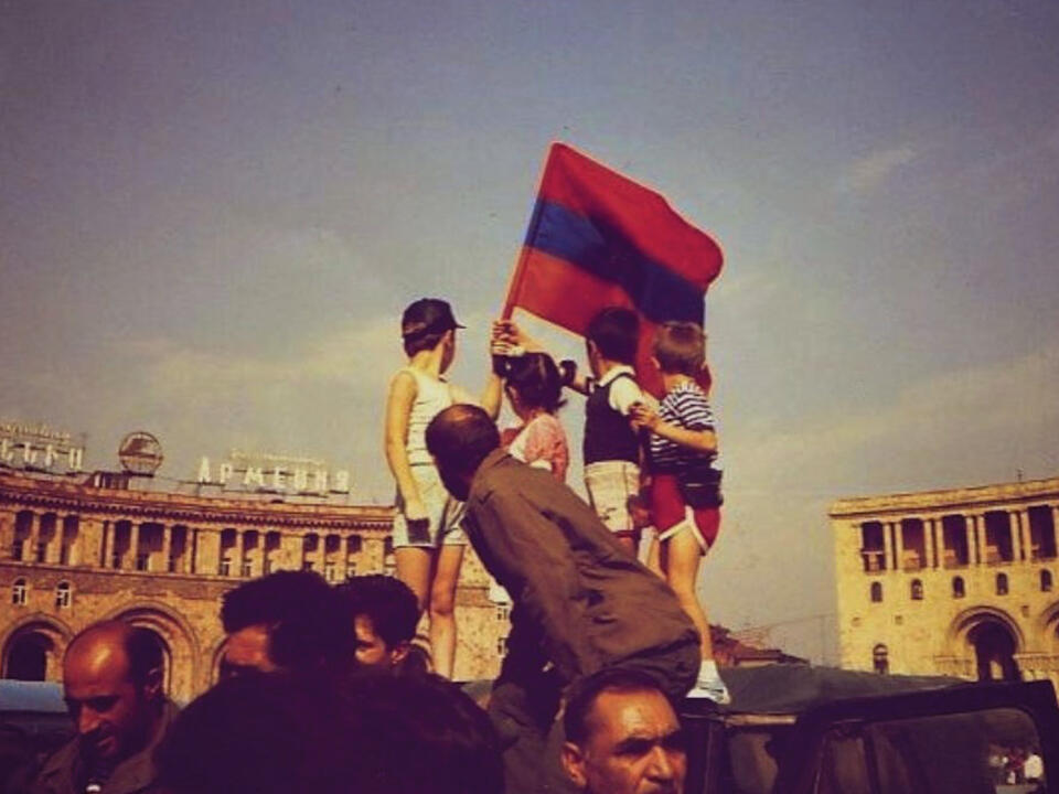 Kids with Armenian flag at Yerevan Republic square