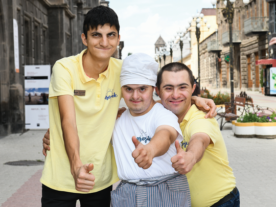 Grisha Khachatryan, Mikayel Sahakyan, and Hovhannes Margaryan, employees of the Aregak Bakery and Café in Gyumri.